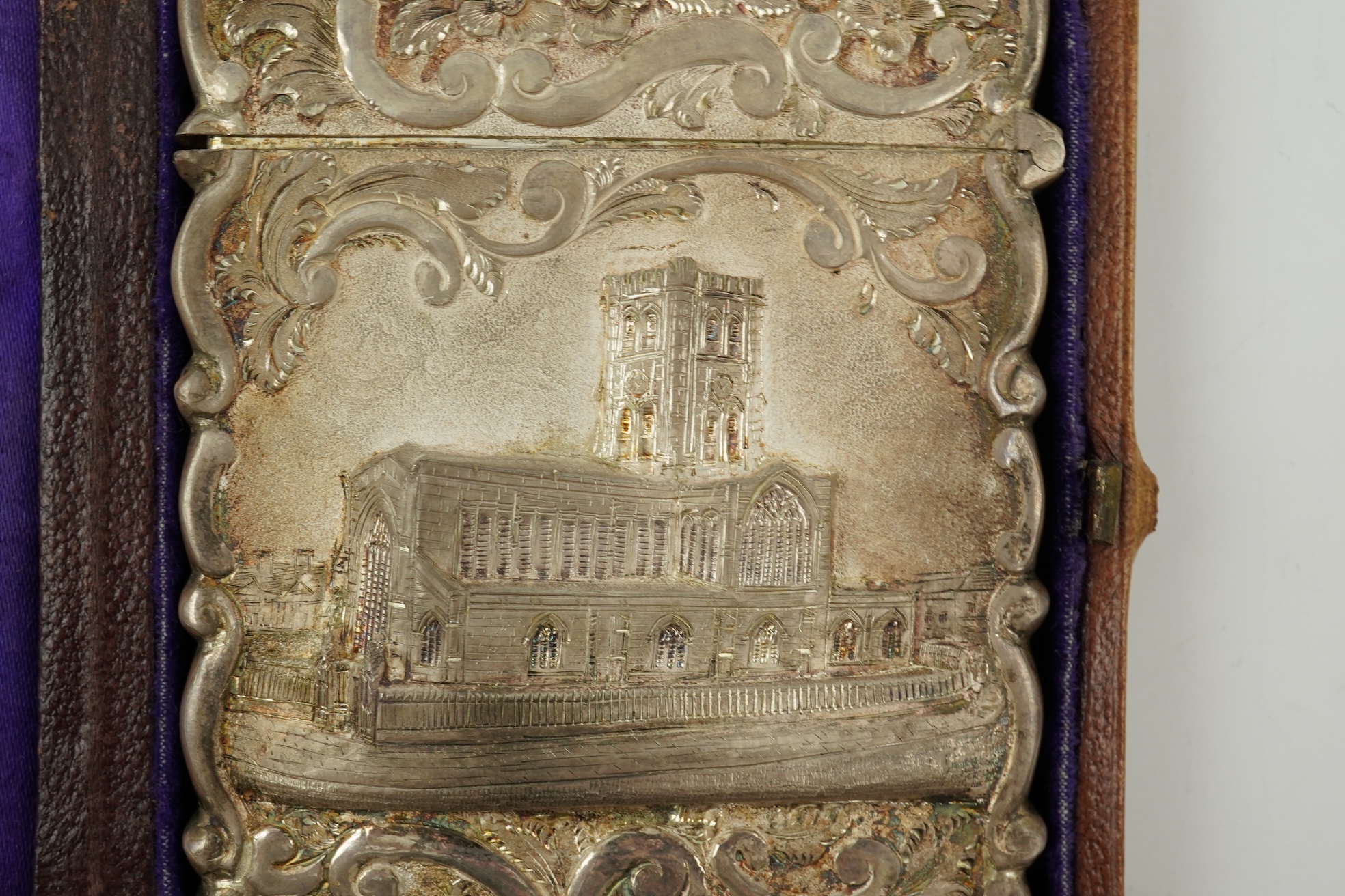 A Victorian silver 'castle top' card case by Hilliard & Thomason?